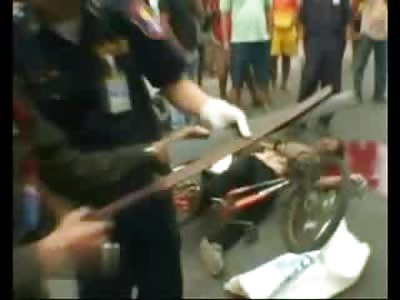 Young Boy Throat Slit by Samurai Sword on his Scooter , Close Up of the Neck Wound