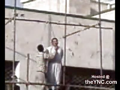 Guy in Iran Hanged in front of Crowd.