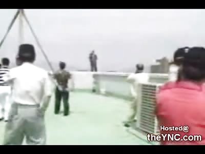 Deranged Man in South Korea does a Backflip off of a 12 Story Tower