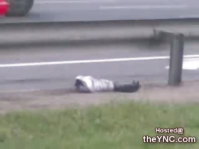 Biker Dead on the Road missing his Arm