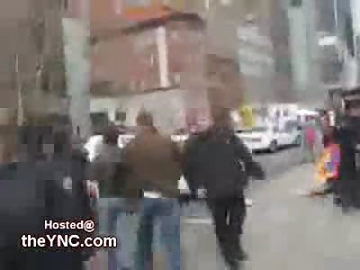 Police Officers beat the Shit out of Crying Tibet Protestors in front of a Screaming Cameraman