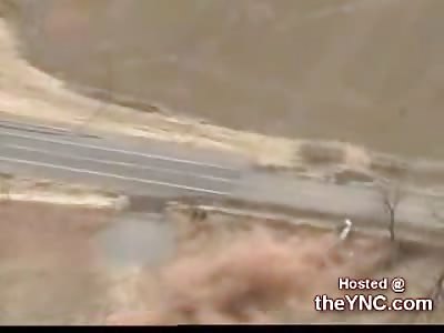 Camera crew Catches Horrible Crash That Ejects Suspect from The Car upon Impact.