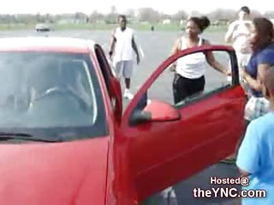 Black Beast of a Girl Beats on another Female from Outside of the Car