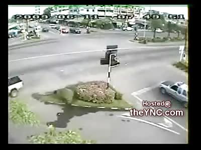 Biker Struck then Run Over by White Pick Up Truck