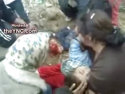 (High Warning!) Mother Holding Half of her Dead Child: Very Disturbing Video shows Kid Cut in Half by Excavator