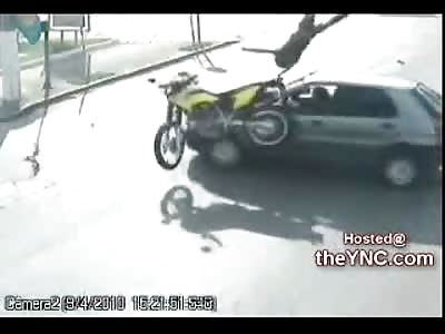 Insane Motorcycle Accident Flips the Biker over the Car onto the Road