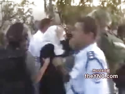 Israeli Solider Headbutts the SHIT out of Arab lady