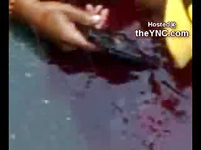 Flowing Blood and Raindrops...Man Shot Dead still has his Pistol in Hand