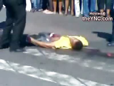 Man Ripped in Half is Cleaned off the Street (2 Different Cameras in Video)
