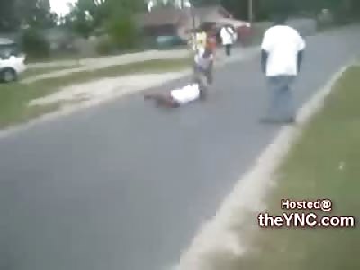 Girl being Coached by her Dad loses her Shirt in Violent Street Fight