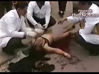 BLOODY Female Murdered is Prepared for the Embalmer right on the Street
