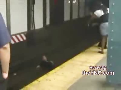 Female Suicidal Raving Lunatic Lays on NYC Subway waiting for Train