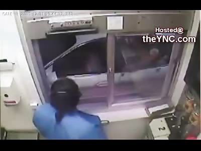 ROAR!! Give me my Chicken Mcnuggets....Woman tries going through the Drive Thru Window