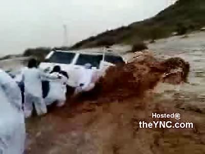 Arab's Rush to to Rescue Idiotic Female during HUGE Flood