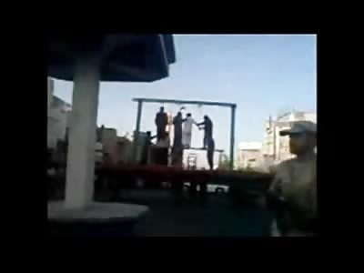 NEW Execution from Iran...Man Taunts Crowd Moments before Death...Man on Left struggles to Free Noose