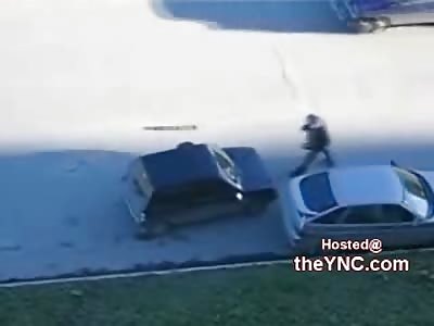 Drunk Moron Fighting a Car gets Jumped by Passers by