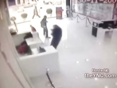 Man Executed in Store..Girl at the Desk Scared Shitless Whacks her Head on the Counter
