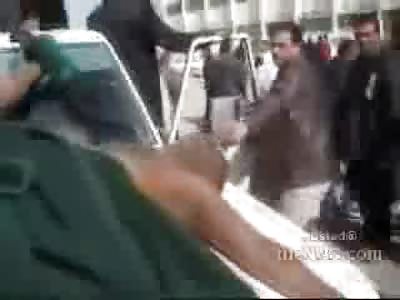Libyans tie Dead Africans to the Hood and Cheer their Death During the Riots