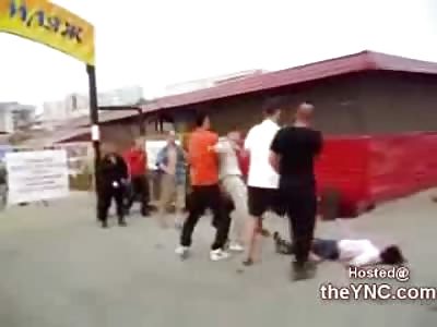 Little Asian Girl gets KO'd by a Man during a Street Fight