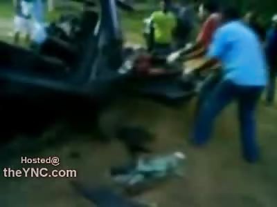 Good Samaritans? Rip Dead Female from Wrecked Vehicle
