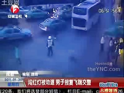 Chinese Dude Drop Kicks a Police Officer Like a Boss