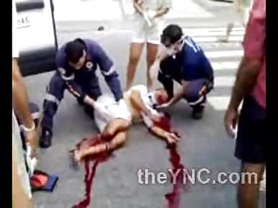 Ladies Leg Flapping Around Bleeds out on Road as Paramedics Try to Save Her