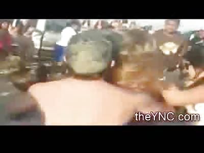 Girl loses Bikini Top in Beach Fight and a Guy gets KO'd