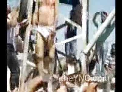 Man in his Underwear is Strung Up and Hanged to Death in front of Chanting Crowd