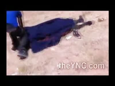 Syrian Rebels Showing off their Kills.....One Man Still Alive 