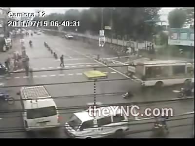 Big Bus Annihilates Two Kids on a Moped....Ouch