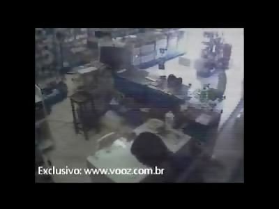 Female Store Clerk is Stabbed to Death and Drops Dead on Camera (Watch Bottom of Screen)