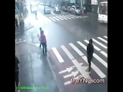 Old Woman and Man on Sidewalk Killed by Bus