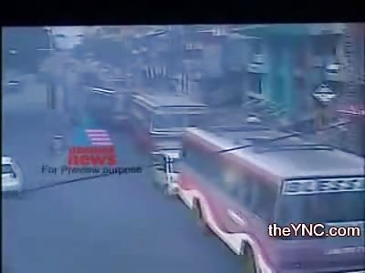 Man in WHite on the Sidewalk Run Over by a Bus
