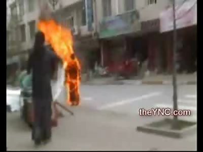FULL Video of Female Tibetan Nun Self Immolation Suicide on the Street (Full Video not on other Sites)