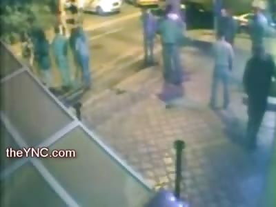 Oh My...Man gets Beaten like a Step Child, Body Slammed to the Concrete and Dragged Off by his Belt