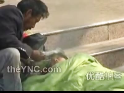 LOVE: Homeless Man Feeds His Sick Wife in the Street