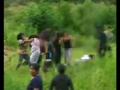 Little Kid Stabs Man right in the Head in Ridiculous Fight in a Field (Stabbing at :37 mark of Video)