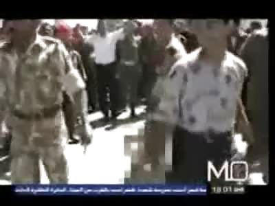 Brutal Murder: Gaddafi Soldiers drag Man out of Building and Beat him to Death in Tripoli Compound