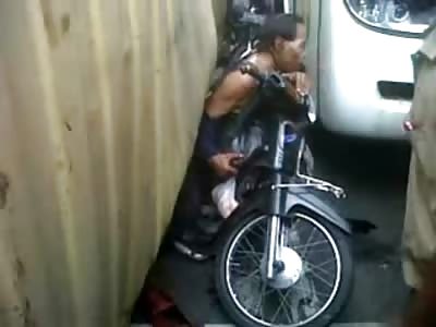 Desperate and Pissed Off Biker stuck underneath a Fence?!