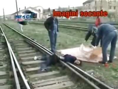 Suicidal Man Cut in Half by Train, laid directly on the Rail to Die 