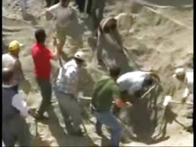Man Buried Alive in Land Slide while Shoveling Sand
