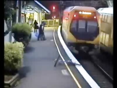 Poor Soul pushing his Bicycle next to a Train finds out to PAY ATTENTION!!!!