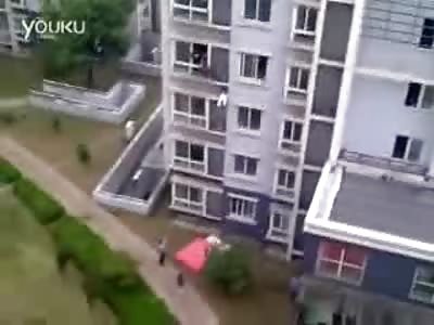 Catch Me!! Chinese Girl Attempts Suicide from her 3rd Floor Bedroom