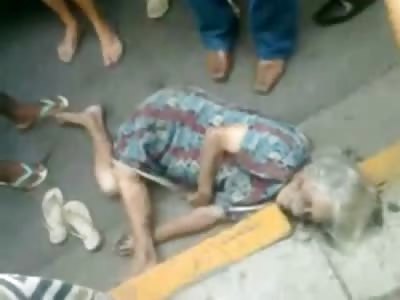 Poor Old Woman Pretzeled Up Dead on the Street
