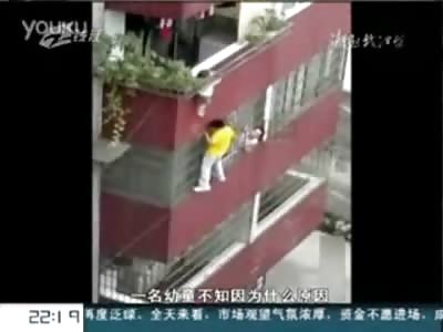 Dangling Baby Rescued by Nervous Father who Scaled Building