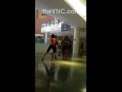 Old Black Woman Take on Two Black Teens in a Shopping Center