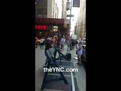 Epic Times Square Crutch Fight...Homeless Man swings like a Champ