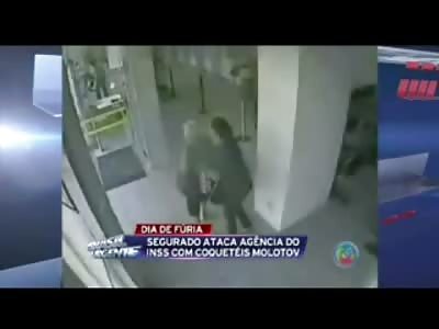 Lunatic enters a Bank Government Building with Molotov Cocktails Starts unloading 