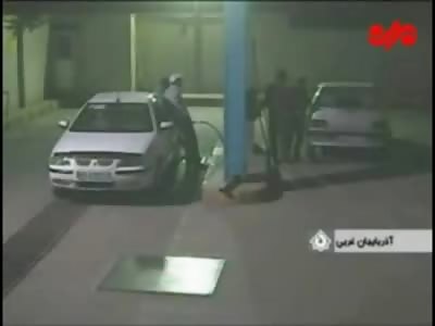 WTF: Car Explodes at a Gas Station Sending Guy Flying