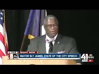 Irate Black Man Storms the Podium on Kansas City Mayor and Unleashes a Barrage of Expletives